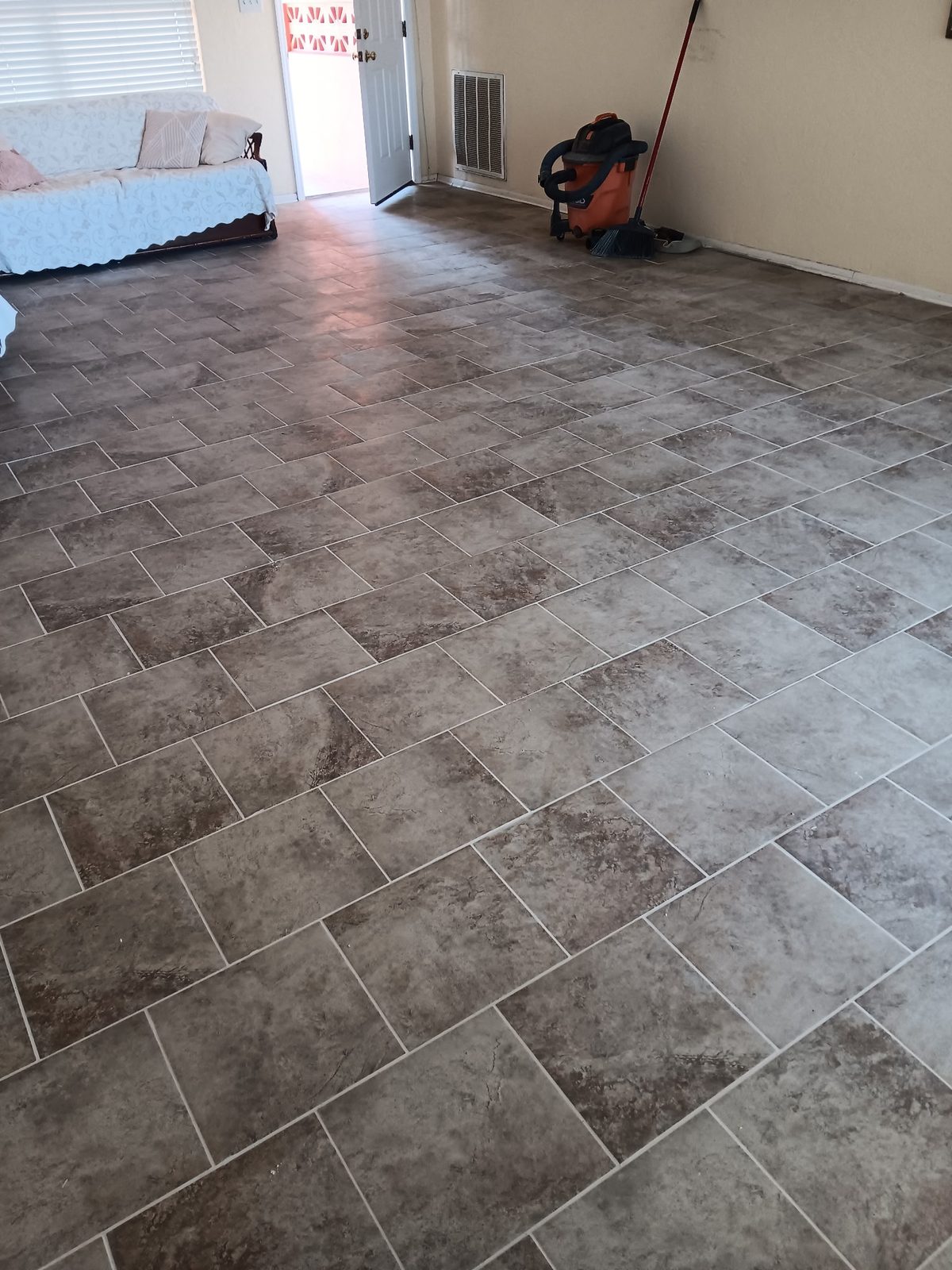 Installed tile flooring in living room